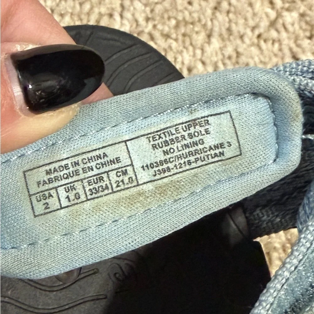 Teva Hurricane XLT2 sandals in a light blue color. Size 2